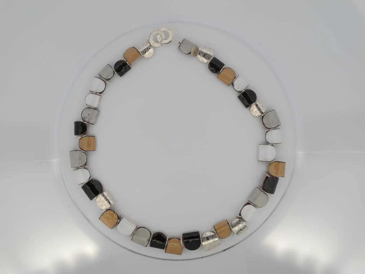 Collier émail nid-cage