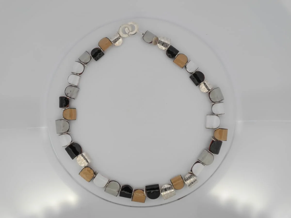 Collier émail nid-cage